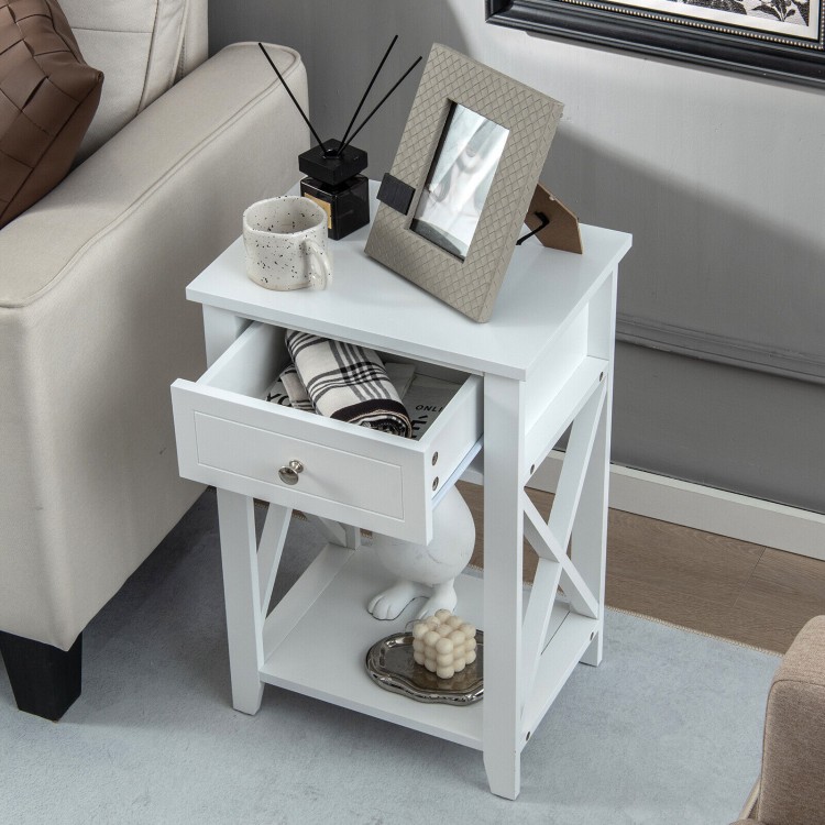 White bedside nightstand with a decorative pull handle, featuring a slide-out drawer and an open bottom shelf for.